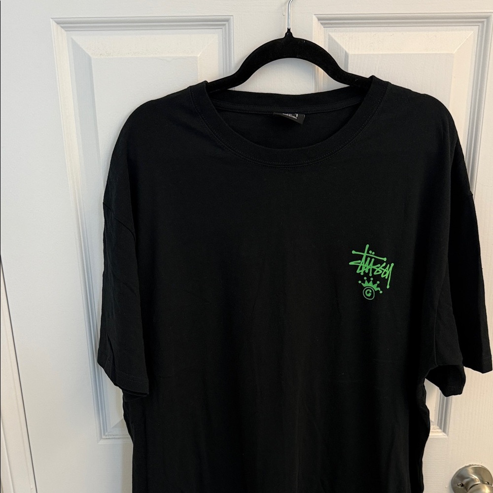 Stussy Black Tee with Vibrant Green Logo